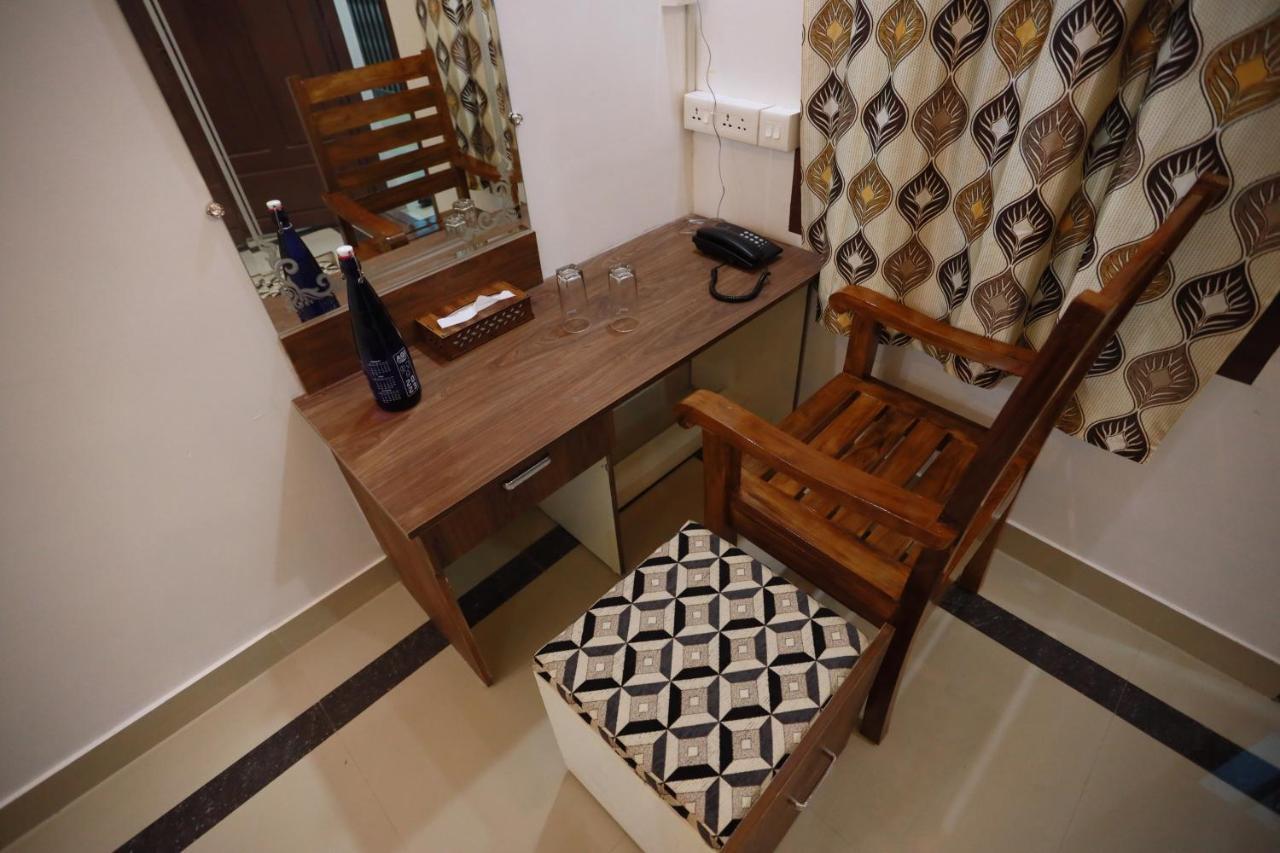 Kausthubhom Residency Hotel Tiruvalla Bagian luar foto